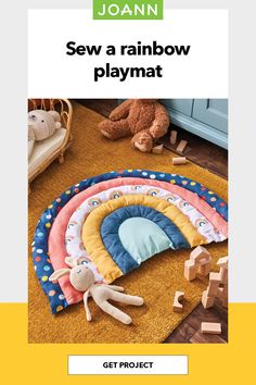 an advertisement for joann's rainbow play mat