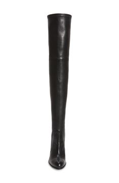 A revamped version of Stuart Weitzman's iconic Highland boot, the soaring Highstreet is fashioned in Spain from swanky stretch leather and detailed with tonal topstitching. A slim tie cinches the thigh-high cuff, while a pointed toe and angular block heel amp the drama. 3 1/2" heel 23 1/2" boot shaft; 12" - 14 1/2" calf circumference; stretches to fit calf Pull-on style with top tie closure Leather upper/leather and textile lining/rubber sole Made in Spain Salon Shoes Luxury Fitted Knee-high Boots With Leather Lining, Sleek Fitted Calf Leather Heeled Boots, Luxury Fitted Knee-high Boots For Fall, Fitted Faux Leather Boots With Leather Sole, Leather Knee-high Boots For Evening In Fall, Tall Sleek Leather Heeled Boots, Classic Fitted Leather Heeled Boots, Sleek Leather Boots For Fall, Designer Fitted Faux Leather Boots