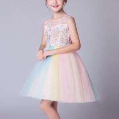 Product Title: Beautiful Embroidered Flower Rainbow Tulle Sleeveless Party DressKeyword Tag: Daddys Girl Mommys World Shirt* Bow and pearl decor* Embroidered flower* Fabric: 80% Polyester, 20% Cotton* Available for Machine Wash as well as TumbleDry* Imported Are you look for a best quality and affordable dress? Then Beautiful Embroidered Flower Rainbow Tulle Sleeveless Party Dress is the best one for you! The Fashion colours with amazing designs for reflect fashion vibes that will embrace you th Sleeveless Tulle Princess Dress For Summer, Sleeveless Summer Tulle Princess Dress, Sleeveless Dress With Appliques For Dress-up, Sleeveless Dresses With Appliques For Party, Princess Style Sleeveless Dresses With Floral Embroidery, Sleeveless Floral Applique Dress For Spring Wedding, Spring Wedding Sleeveless Dress With Floral Applique, Princess Style Tutu Dress With Floral Applique For Party, Spring Princess Dress With Floral Applique For Fancy Dress