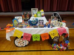 a table with pictures and decorations on it