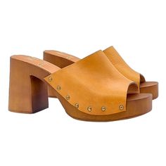 "If you prefer comfort and love casual, our clogs will adapt perfectly to your outfit. Clogs with brown \"effect\" wood base Upper in tan leather Comfortable and regular insole Wide and comfortable 8.5 cm heel and 3 cm plateau Entirely made by specialized Italian personnel Handcrafted using the best materials BEFORE COMPLETING YOUR PURCHASE DO NOT FORGET TO CHECK THE SIZE!" Brown Wooden Platform Clogs, Casual Wood Mules With Round Toe, Wooden Platform Clogs With Round Toe, Casual Wooden Clogs With Wooden Heel, Brown Closed Toe Clogs With Deep Heel Cup, Brown Wooden Round Toe Mules, Brown Wooden Mules With Round Toe, Brown Wood Mules With Round Toe, Casual Brown Clogs With Wooden Heel