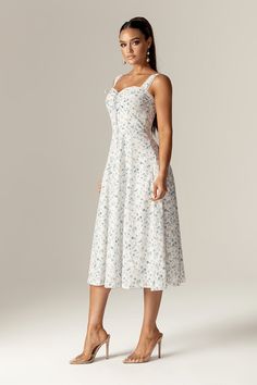 You'll feel ultra feminine in our 'Barbora' dress that's the perfect match for spring and summer garden parties. Our 'Barbora' dress It's cut from our lightweight crepe for a fresh feel and is decorated with a pretty blue and white floral. The bodice has corsetry boning to the front, back and sides for that perfect cinched hourglass shape and the lightly shaped cups are lined for a comfortable fit. The pretty lace trim straps add to the fun and floaty vibe of 'Barbora' and we love the way that t Sundress Blue, Summer Garden Party, Midi Sundress, Ultra Feminine, Blue And White Floral, Hourglass Shape, Garden Parties, Summer Garden, The Pretty