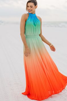 Tis ombre maxi dress is a real show stopper! Those hues are wonderfully vibrant and we love that flowy yet flattering cut. This maxi dress is perfect for attending summer or destination weddings! Halter round neckline Button keyhole back Sleeveless Smocked stretchy waist Vibrant ombre print No stretch Savannah is wearing the small. Multicolor Floor-length Maxi Dress For The Beach, Fitted Ombre Maxi Dress For Summer, Summer Tie-dye Maxi Dress For Beach, Flowy Tie-dye Summer Beach Dress, Spring Tie-dye Maxi Dress For Beach, Ombre Maxi Dress, Ombre Print, Orange Ombre, Scarf Sale