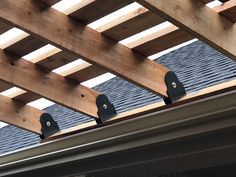 the roof is covered with wooden slats