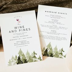 two wine and pines cards sitting on top of a table