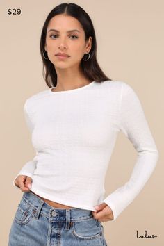 Add an eye-catching piece like the Lulus Iconic Composure White Textured Twist-Back Long Sleeve Top to any outfit to make it instantly unique! Stretchy, smocked-like textured knit fabric shapes this too-cute top that features a classic crew neckline and long sleeves. The fitted, cropped bodice boasts a trendy twisted detail and a flirty cutout at the back to complete the look. Fit: This garment fits true to size. Length: Size medium measures 19.5" from shoulder to hem. Bust: Great for any cup si Macy Aesthetic, White Long Sleeve Shirts, White Long Sleeve Shirt Outfit, White Tops For Women, White Top Long Sleeve, Long Sleeve Shirt Outfits, Adhesive Bra, Aesthetic Things, White Long Sleeve Shirt