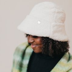 Meet our new Sage Sherpa Bucket Hat! This accessory is perfect for the fall/winter months, keeping you warm and stylish all season long. The Sage hat includes a thicker band around the head to add extra detail to the hat, and it's adjustable! Available in 2 colors including mocha and cream. Material: 100% Polyester Sherpa Bucket Hat, Winter Months, The Head, 2 Colours, The Fall, Mocha, Bucket Hat, Fall Winter, Band