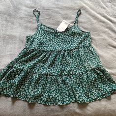 New With Tags! Super Cute With A Pair Of Jean Shorts Adjustable Straps! H&m Summer Beach Tops, H&m Green Tops For Spring, H&m Spring Cami Tops, H&m Floral Print Tops For Day Out, Green Cotton H&m Tops, H&m Cotton Top For Vacation, H&m Spring Tops For Vacation, H&m Tops For Spring/summer, Casual Green H&m Tops