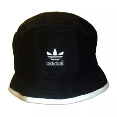 Brand New Mens Adult Vintage 90s Adidas Bucket Hat. This Bucket Hat Is Mens Sz. Small/Medium. The Front Has The Embroidered Adidas Logo On It In White. The Colors Of It Are Black And White Made By Adidas. Made Of 100% Cotton Material. Adidas Adjustable Casual Bucket Hat, Adidas Casual Adjustable Bucket Hat, Trendy Winter Streetwear Bucket Hat, Adidas Cotton Hats For Summer, Adidas Hats For Summer Streetwear, Adidas Cotton Summer Hats, Black Retro Bucket Hat For Summer, Retro Black Adjustable Bucket Hat, Black Bucket Hat For Spring Streetwear