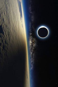 an eclipse is seen over the earth from space