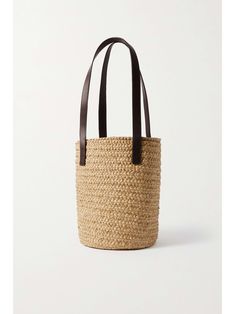 SAINT LAURENT Panier small leather-trimmed raffia tote Straw Bucket Bag With Intrecciato Weave, Beige Bucket Bag With Intrecciato Weave For Vacation, Casual Bucket Straw Bag With Intrecciato Weave, Summer Rectangular Bucket Bag With Intrecciato Weave, Basket-shaped Straw Bag With Intrecciato Weave, Beach Bucket Bag With Intrecciato Weave, Vacation Bucket Bag Tote With Intrecciato Weave, Summer Brown Bucket Bag With Intrecciato Weave, Summer Bucket Bag With Intrecciato Weave