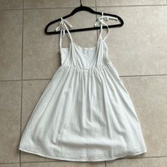 Excellent Condition. Never Worn. Just Washed And Hung To Dry. Cotton Mini Sundress For Brunch, Mini Dress For Daywear, Cotton Tie Back Mini Dress For Brunch, Cotton Sundress Mini Dress For Brunch, White Sundress With Tie Straps For Brunch, Cotton Lined Mini Sundress, White Vacation Dress With Tie Straps, Tie Strap Sundress, Cotton Mini Dress With Spaghetti Straps For Brunch