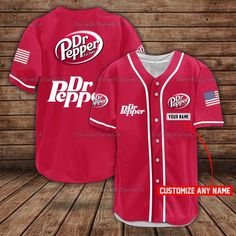 a red baseball jersey with the words dr pepper on it