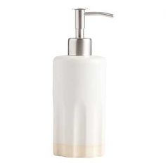 a white soap dispenser on a white background