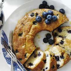 a blueberry bundt cake on a plate with a fork