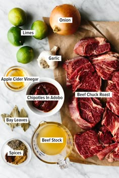 the ingredients needed to make an apple cider vinegar beef roast recipe on a cutting board