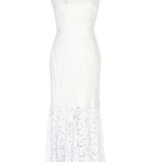 a white dress on a mannequin neckline with an open back and lace detailing