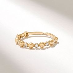 Diamond Bold Beaded Ring/ Solid Gold Stacking Ring/Diamond Ball Ring/Womens Dainty Dot Ring/Real Diamond Designer Ring/14k Diamond Bead Ring Features * Made to Order. * Gold KT: 10K, 14K, 18K * Custom Gold Color: Rose Gold, Yellow Gold, White Gold * Diamond Color- Clarity: D-E-F color VVS clarity (excellent ideal cut) * Total Ctw: 0.21 ctw * Top of Band: 2.90MM * Width of Band: 1.40MM * Thickness of Band: 1.15MM * Ready to Ship in 5-7 Business Days ▶ Want to find out more? Check out my shop http Elegant Adjustable Halo Stackable Rings, Luxury Adjustable Stackable Diamond Ring, Elegant Adjustable Bezel Set Diamond Ring, Diamond Ball, Ring Enhancer, Dot Ring, Diamond Stacking Rings, Beaded Ring, Gold Ring Stack