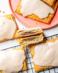 pastries with icing on a cooling rack