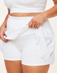 The Birdie Plus white active skirt is all about practicality and style. This skort is perfect for activities like tennis or pickleball, while also being perfect for everyday wear. The compressive under shorts and sweat-wicking fabric gives you the perfect balance of comfort and support. (Available in plus-sizes 1X-4X.) Under Shorts, Being Perfect, Adore Me, Pickleball, Birdy, Apparel Accessories, Lotus, Tennis, Everyday Wear