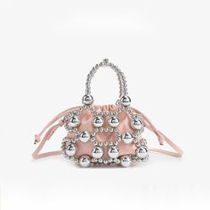 Place Of Origin : HE BEI  Province Place Of Origin : HE BEI Province Model Number : pink Decoration : CHAINS Lining Material : POLYESTER Main Material : PU Shape : Bucket CN : Hebei WHAT ABOUT REFUND?   Fast refund,100% Money Back Guarantee. If your product is defective or doesnt work properly, let us know and well send you a replacement one. We believe in our products so much that we offer a 30-day No-Hassle refund policy. If youre unhappy about your purchase, send us the product back and well refund your money immediately. Elegant Beaded Top Handle Bag, Silver Beaded Pouch Bag, Glamorous Beaded Silver Bag, Luxury Chic Beaded Bags, Luxury Glamorous Beaded Shoulder Bag, Handbag For Women, Pink Decor, Work Bag, Creamy White