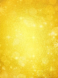 an abstract yellow background with stars and sparkles