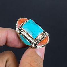 Turquoise Ring Red Coral Ring Size US 10 Inch Tibetan Silver Ring Handmade Jewelry Ring Tibetan Ethnic Tribal Ring Nepali Jewelry For Sister SKU :- PT-778 Statement Tibetan Rings Metal Purity :- Tibetan Silver Gemstone :- Turquoise, Coral Stone Color :- Green, Red Ring size :- US 10 Inch Weight :- 27 Gram ########## * They are handmade and designed carefully by craftsmen * Different gemstones and brass parts brought together to create an elegant piece * These are pieces to treasure that are sure