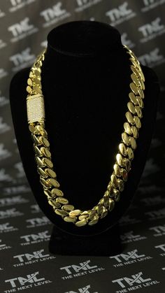 PRODUCT IS BACK IN STOCK AND READY TO SHIP - GRAB YOURS NOW BEFORE THEY'RE GONE AGAIN! 🚀🔥 ⛓ The Chain: Introducing our stunning 20mm Cuban Link Chain with a dazzling diamond clasp! Measuring 24 inches in length, this exquisite piece of jewelry is the perfect addition to any fashion-conscious individual's collection. Crafted with precision and care, this chain boasts a bold 20mm width that exudes strength and confidence. The links are made with a high-quality metal that is both durable and long-lasting, ensuring that this chain will withstand the test of time and remain a treasured possession for years to come. The highlight of this Cuban Link Chain is its striking diamond clasp, which adds a touch of luxury and sophistication to an already impressive piece. This clasp is adorned with shi Gold Cuban Link Necklace For Streetwear, Chunky Chain Cuban Link Necklace For Streetwear, Chunky Cuban Link Necklace For Streetwear, Luxury Chunky Cuban Link Necklace, Gold Cuban Link Necklace With Curb Chain For Streetwear, Gold Chunky Chain Jewelry For Streetwear, Cuban Link Chain Necklace For Streetwear, Luxury Chunky Cuban Link Chain Jewelry, Luxury Chunky Cuban Link Chain Necklace