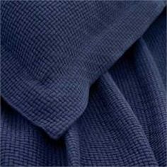 an image of a blue cloth textured with some sort of fabric that is very soft