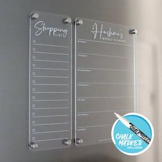 a refrigerator door with two magnets on it and a sticker that says shopping list