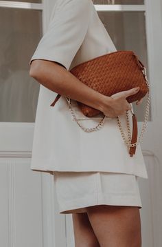 The Paula Woven Crossbody Bag – Handmade in Tuscany, this bag comes with everything you need to carry it with you at all times. #madeinitaly #parisian #parisianstyle #parisianstreetstyle #parisianstyle #parisianvibe #parisianchic #minimalstyle #minimaliststyle #frenchvibe #italianstyle #effortlessychic #ootd #parisiennestyle #capsulecloset #bymilaner #casualchic #everydayfashion #luxurybag #leatherbag #everydaybag #spring On-the-go Woven Leather Pouch Shoulder Bag, Everyday Braided Handles Crossbody Clutch, Everyday Use Braided Handles Crossbody Clutch, Modern Shoulder Bag With Braided Handles Clutch, Leather Clutch With Braided Handles For Daily Use, Chic Everyday Woven Leather Clutch, Chic Woven Leather Clutch For Everyday Use, Workwear Woven Leather Shoulder Bag, Everyday Woven Leather Clutch