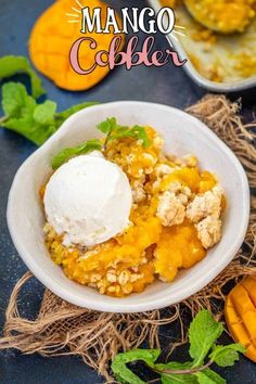 a white bowl filled with ice cream next to sliced peaches