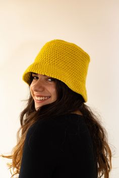 Crochet wool fisherman hat. I made this hat in a warm yellow alpaca wool blend. It is a large and comfortable boho style hat that is very comfortable to wear. The hat can be folded without losing its shape. Created and produced by Allegretta Handmade® © All rights reserved COMPOSITION Alpaca wool blend COLORS Yellow SIZE XL Hat circumference 58-60 cm / 23 inch WASHING ADVISE Hand wash with mild soap.  Dry flat.  USEFUL INFORMATION  The artisanal realization can determine very small variations of Crochet Fisherman Hat, Oversized Hat, Wool Crochet, Women Hat, Crochet Bucket Hat, Crochet Wool, Fisherman Hat, Christmas Gifts For Friends, Winter Mode