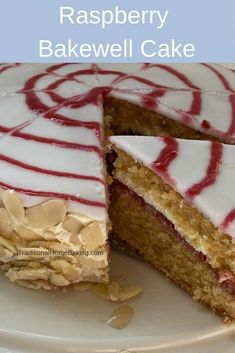 a close up of a cake on a plate with the words raspberry bakewell cake