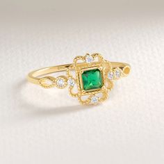 Here's Emerald Diamond Birthstone Ring Art Deco. This 14K Gold Personal Stone Engagement Ring will be perfect Personal Stone Ring for Her, Bride and wife! We can create 18K Custom Gemstone Jewelry with her wedding, engagement or anniversary night ceremony. This Luxury Ring will be best gift for your wife or mother as well! This 14K Anniversary Ring is great shower ring with Stunning and Dainty Birth Stone. This Unique Designer Ring will be will be either special night shower ring!  Emerald Diamond Ring can be switched with her birth month stone as a Birth Month Ring. This Dainty and delicate inspirational ring has symbolizing your everlasting love & serves as a perfect gift for Fiance, wife, women or gifted from mom Please check our other engagement rings: https://www.etsy.com/shop/Cristoj Heirloom May Birthstone Cluster Ring For Promise, Green 14k Gold Rings For Anniversary, Diamond Cluster Ring For May Birthstone Gift, Diamond Cluster Ring As May Birthstone Gift, Gold Cluster Ring For May Birthstone Gift, Gold Cluster Ring With May Birthstone, Heirloom Cluster Ring For Anniversary With May Birthstone, Gold Emerald Ring With Diamond Halo, Gold Emerald Ring With Halo Diamond Design