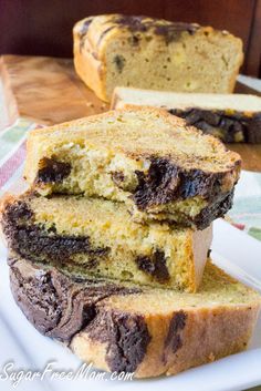 two slices of chocolate chip bread stacked on top of each other with one slice cut out