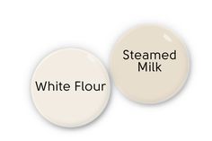 two white buttons with the words steamed milk and white flour written on them in black