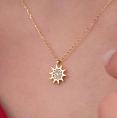 Our sunburst necklace is 14k solid gold. It has round zircon stones on it that look fascinating. It has a minimalist and dainty style. When considered as a gift, it will be a perfect gift that makes your loved ones happy on their birthday, mother's day, valentine's day, anniversaries, graduation, or women's day. 🎁 If you want, you can add a gift note for your loved ones. It arrives in a special jewelry gift box. ✨ We respond to your questions happily. Your question will be answered within 24 ho Starburst Cubic Zirconia Jewelry Gift, Elegant Starburst Necklaces For Gifts, Diamond Starburst Jewelry For Gifts, Starburst Diamond Jewelry As A Gift, Starburst Diamond Jewelry As Gift, Yellow Gold Starburst Necklace As Gift, Starburst Diamond Jewelry For Gift, Yellow Gold Starburst Necklace For Gift, Starburst Diamond Jewelry Gift