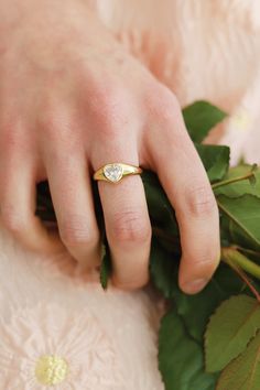 Add a touch of sparkle and sophistication to any outfit with our Crystal Heart Signet Ring. This dainty open ring features a stunning zirconia stone nestled in a heart-shaped setting. Whether worn every day or saved for special occasions, this ring is a timeless piece that will elevate any look. Valentines 2024, Heart Signet Ring, Ring Aesthetic, Heart Shaped Ring, Tiffany And Co Jewelry, Heart Shaped Rings, Tiffany And Co, Stone Gold, Stone Heart