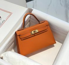 HM Mini Kelly Orange For Women Gold Toned Hardware 7.5in/20cm Mini Kelly, Classy Work Outfits, Hermes Bags, Fun Bags, Luxury Items, Silver Hardware, Bags Accessories, Mini Bag, Fashion Bags