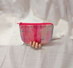 Beautiful multi-colored pouch with pink, teal, and purple. Pink Coin Purse With Removable Pouch, Pink Zipper Pouch Pencil Case, Pink Zipper Pouch Coin Purse, Pink Pencil Case With Removable Pouch, Handmade Pink Pouch Coin Purse, Handmade Pink Coin Purse, Pink Pouch For Everyday Use, Pink Zipper Pouch For Everyday Use, Handmade Pink Pouch Cosmetic Bag