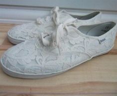 Vintage white canvas shoes with ivory lace over the top. Hardly worn. I wear a 9 to 9.5 and these are too big for me. I guessing that they might be pretty true to size. Very unique and unusual large size in great condition. These will be shipped in a bubble wrapped mailer. If you would like to upgrade to a box for an extra charge let me know. From my experience, I have found that vintage shoes and boots mostly but not always run small. I usually need a 1/2 to a full size larger than I wear in mo Vintage White Lace-up Sneakers, Vintage Low-top Sneakers For Spring, Cream Sneakers With White Laces For Spring, Vintage Cream Sneakers With Round Toe, Vintage White Sneakers For Spring, Vintage Summer Sneakers With Round Toe, Vintage Round Toe Sneakers For Summer, Vintage Low-top Summer Sneakers, Vintage Low-top Sneakers For Summer