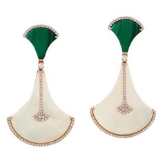 Hand cast from 18-karat gold, these stunning earrings are set with 6.83 carats malachite, 21.15 carats mother of pearl and .86 carats of glimmering diamonds. FOLLOW MEGHNA JEWELS storefront to view the latest collection & exclusive pieces. Meghna Jewels is proudly rated as a Top Seller on 1stDibs with 5 star customer reviews. All items manufactured by us are handmade and can be customized or redesigned. Composition Size-51X28 MM Total Weight-14.69 Gold Weight(Gms)-8.923 Diamond Wt(Cts)-0.86 Malachite Wt(Cts)-6.83 MOP Wt(Cts)-21.15 Mop Jewelry, Hoop Earrings Diy, Mother Of Pearl Jewelry, Malachite Jewelry, Cubic Zirconia Earrings, Custom Earrings, Emerald Earrings, Pearl Diamond, Art Deco Jewelry