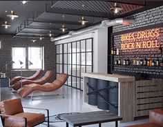 an industrial style lounge area with brick walls