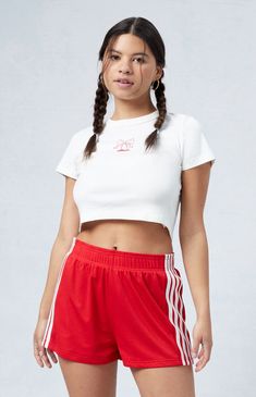 Elevate your court style with PacSun's Standard Basketball Shorts – a perfect fusion of comfort and sporty flair. Crafted with breathable mesh fabric and a relaxed fit and topped off with sporty side stripes, these high-waisted shorts ensure you stay on top of your game while making a statement on and off the basketball court.Lined12.5" rise2" inseamHigh-riseElastic waistbandStripes down sidesMesh fabricRelaxed fit100% polyesterModel is wearing a size smallModel measurements: 5’7” height, 34” bust, 25” waist, 35.5” hipMeasurements taken from a size small PacSun Womens Standard Basketball Shorts - Red size Small Slim Fit Cargo Pants, Kids Activewear, Adidas Shorts, Jeans Kids, Kids Swimwear, Dream Board, Basketball Shorts, Red Shorts, Slim Fit Pants