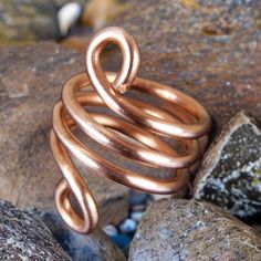 a ring sitting on top of some rocks