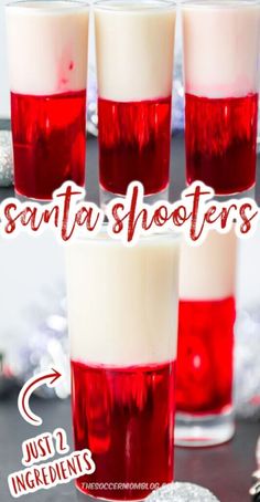 three shots with red and white liquid in them on a table next to christmas decorations