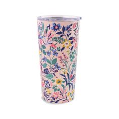 the tumbler is decorated with colorful flowers