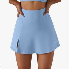 Brand New Tennis Skirt In Great Condition With Built In Shorts Size Xl Fits Like A Lg, Sizing Listed In The Pictures As Well Bundle And Save No Returns Blue Stretch Tennis Skirt With Elastic Waistband, Stretch Blue Tennis Skirt With Pockets, Blue Stretch Tennis Skirt With Pockets, Casual Blue Tennis Skirt With Elastic Waistband, Light Blue Stretch Mini Skirt, Blue Mini Skort With Built-in Shorts, Light Blue Stretch Skort For Summer, Fitted High Waist Light Blue Skort, Blue High Waist Swim Skirt For Spring