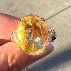 Incredible , Oversized Vintage Ring With Large Oval Citrine Stone And 6 Small, Round Sparkling Diamonds. The Ring Is A Size 8 On Ring Mandrel, Hallmarked 585 And 14k (Acid Tested As Well) , There Is Another Stamp, Designer/Makers Stamp, But I Cant Make It Out . The Ring Weights Heavy 11.5 Grams. The Oval Citrine Stone Is Approx.18x14 Mm In Size. Each Round Cut Diamond Is Approx. 2.25mm In Size , Which Is Approx. 0.12 As Per Google Chart . The Ring Is Superb , Statement Piece Of Jewelry ! Ring Mandrel, Yellow Diamond Ring, Yellow Diamond Rings, Diamonds Ring, Citrine Stone, Yellow Diamond, Vintage Ring, Sparkle Diamonds, Round Cut Diamond